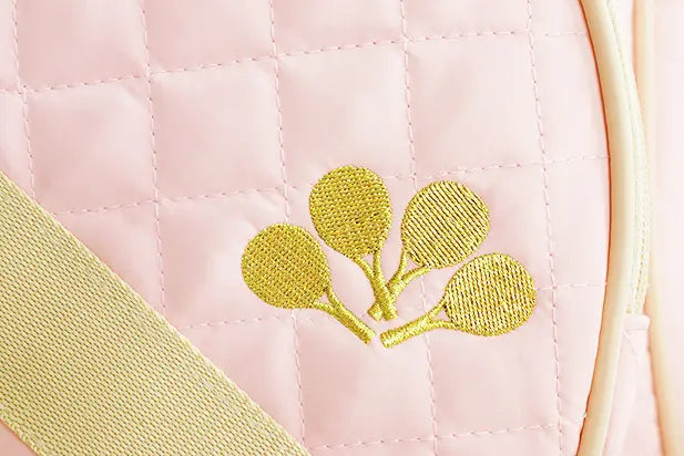 closeup shot of esserly logo on pink padel bag